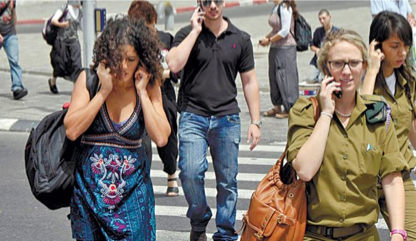Israelis-on-the-phone-in-Tel-Aviv.jpg