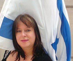 Julie-Burchill-with-Israeli-Flag.jpg