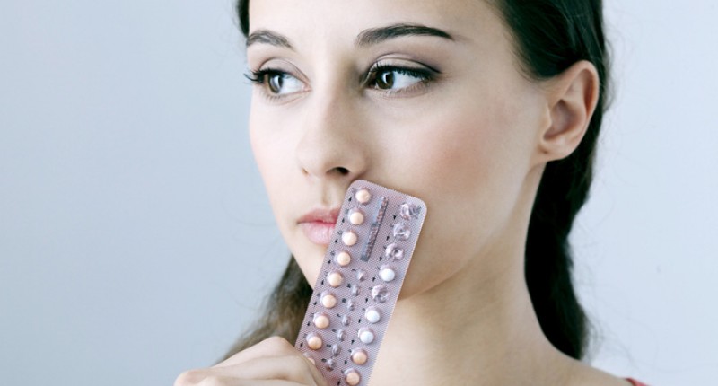 Woman-with-birth-control-pills-via-Shutterstock-800x430.jpg