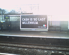 cash-is-so-last-millennium-billboard.jpg