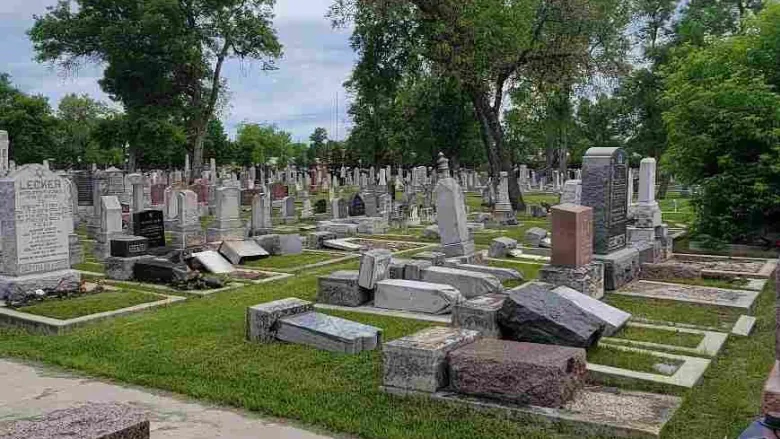 gravestones-tipped-over-in-jewish-cemetery.png