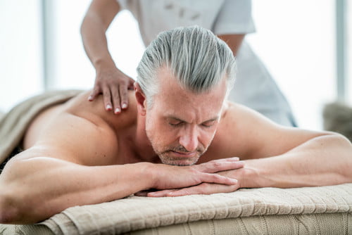 older-man-getting-a-massage-gettyimages-695686100-500x500.jpeg