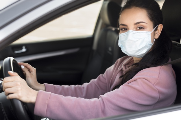 woman-wearing-medical-mask-car_23-2148510560.jpg